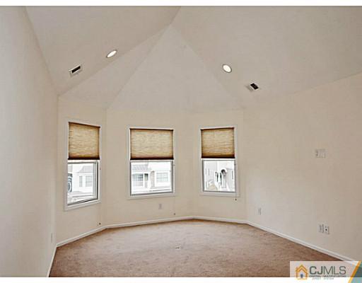 27 Raritan Reach Road South Amboy, NJ 08879 - Photo 12 of 24 an empty room with windows