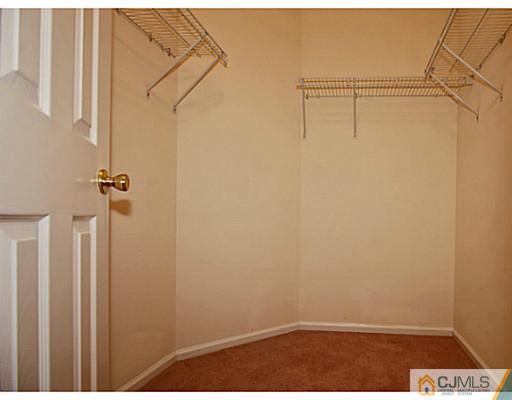 27 Raritan Reach Road South Amboy, NJ 08879 - Photo 14 of 24 a view of small space with empty racks on the wall