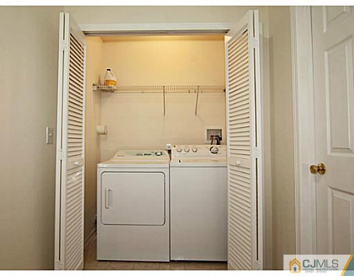 27 Raritan Reach Road South Amboy, NJ 08879 - Photo 19 of 24 a view of bathroom with washer and dryer