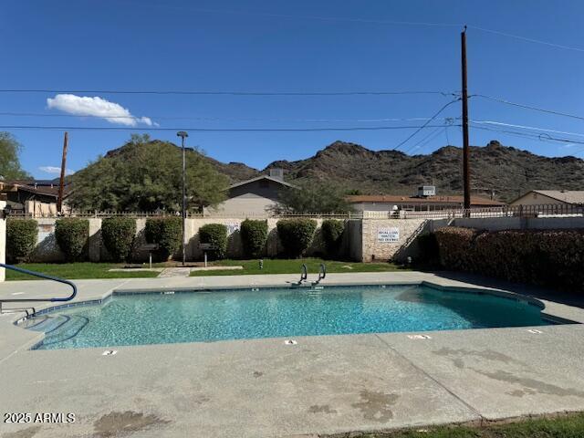 8861 North 12th Place Phoenix, AZ 85020 - Photo 23 of 25 a view of outdoor space yard and swimming pool