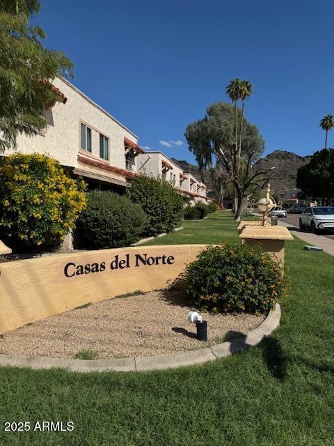 8861 North 12th Place Phoenix, AZ 85020 - Photo 25 of 25 a view of a house with a yard and potted plants