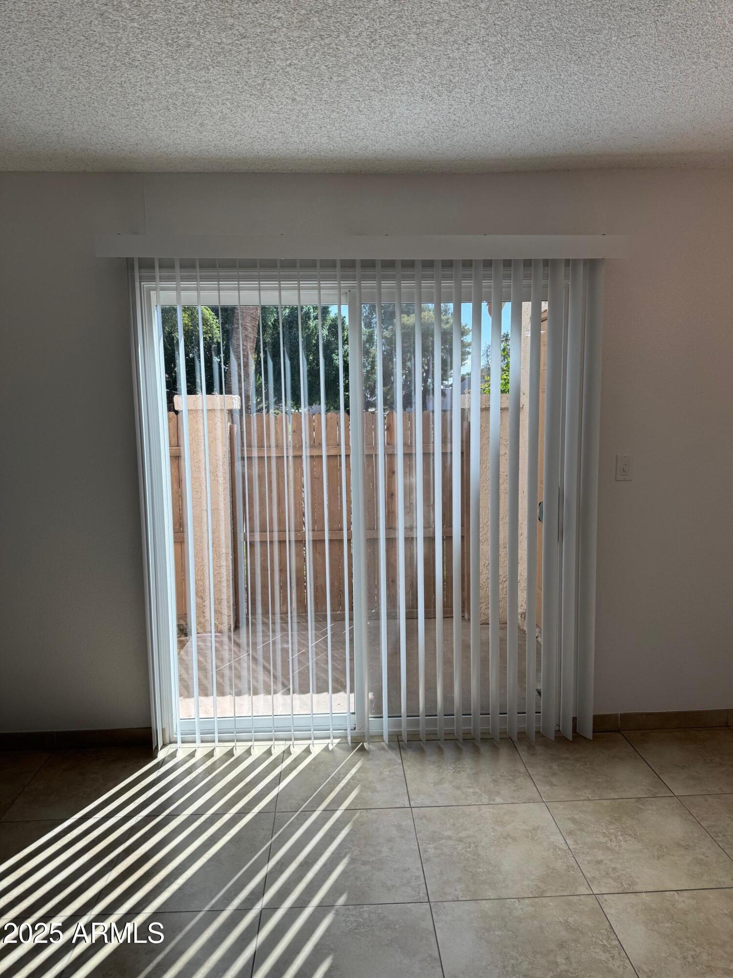 8861 North 12th Place Phoenix, AZ 85020 - Photo 6 of 25 a view of a room with wooden floor