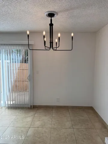 a view of a storage & utility room with racks on the wall