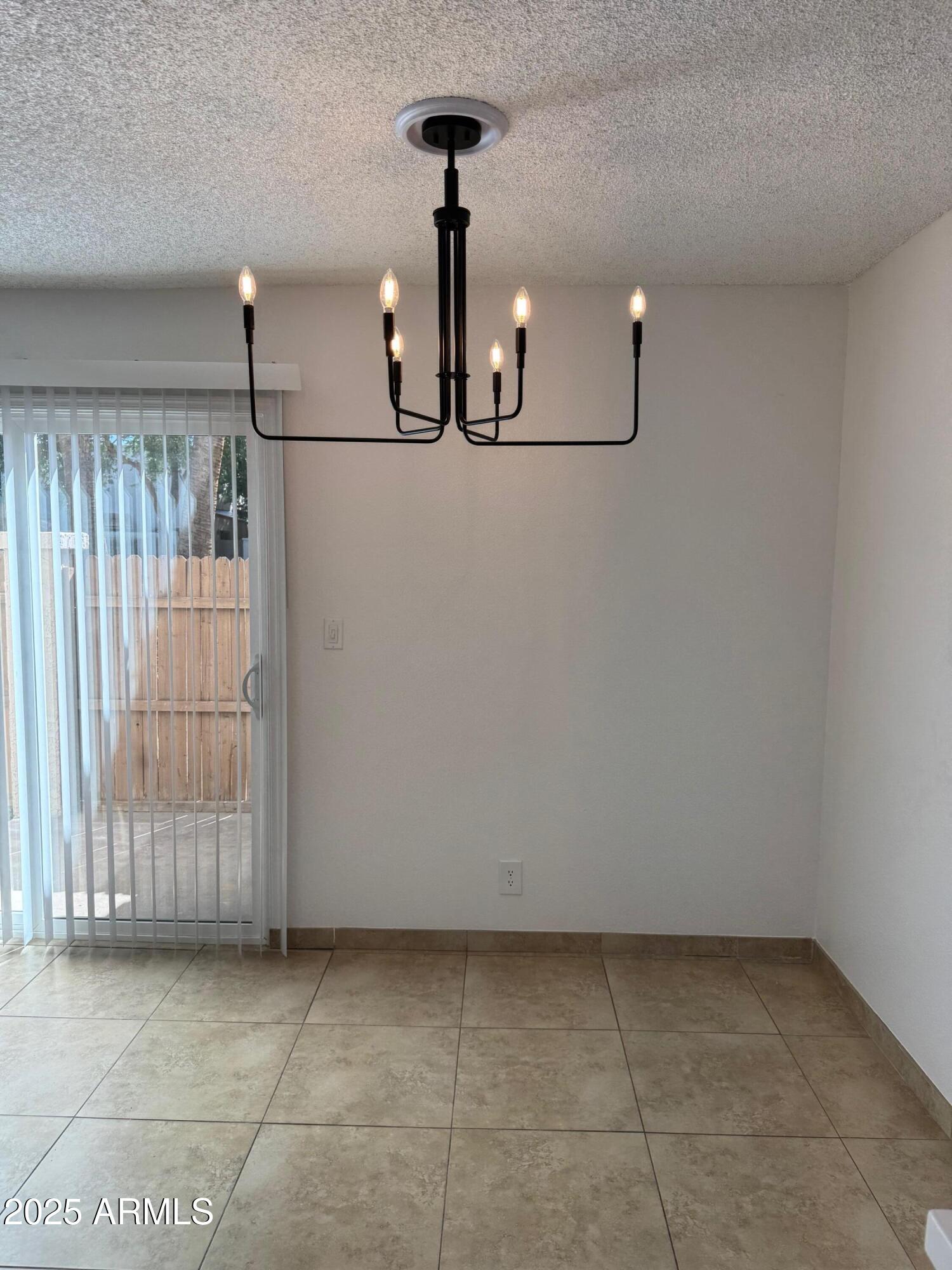 8861 North 12th Place Phoenix, AZ 85020 - Photo 7 of 25 a view of a storage & utility room with racks on the wall