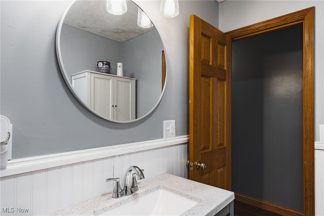 111 River Hill Road Washington, WV 26181 - Photo 17 of 29 Showing the nice mirror over the vanity.