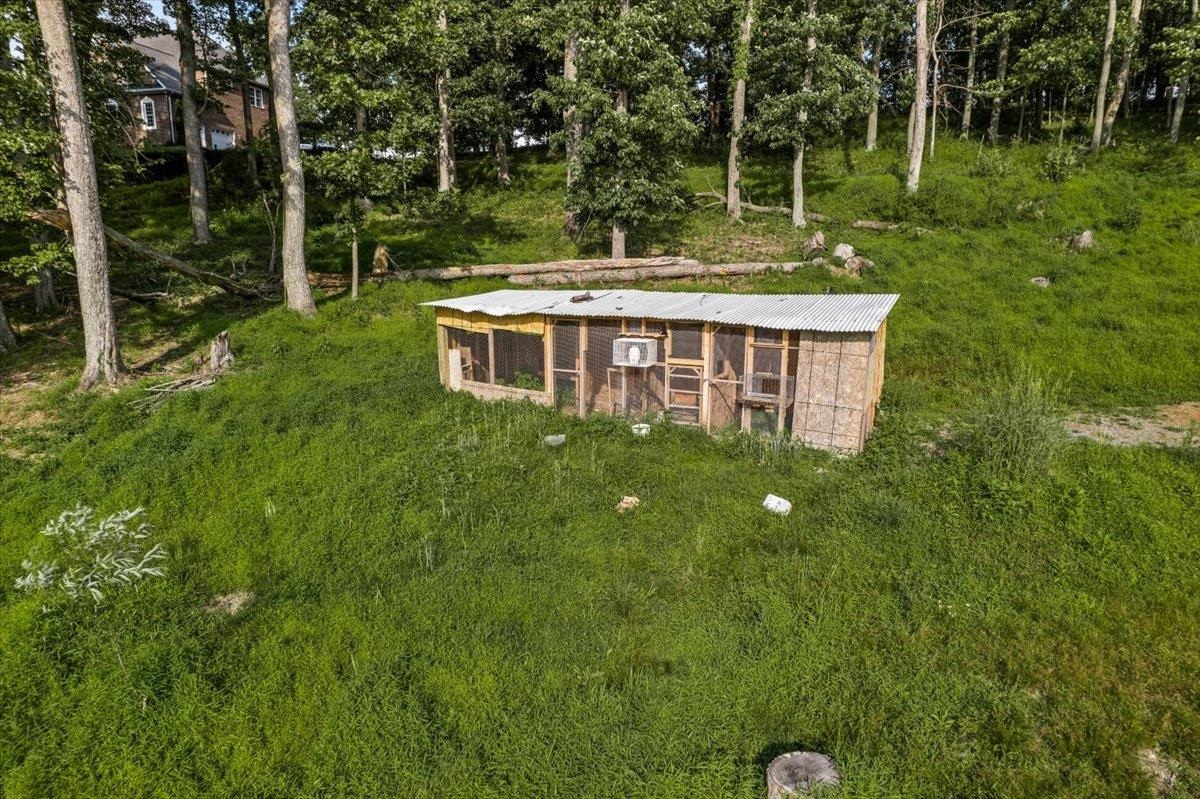 0 Rodeo Drive Harrisonburg, VA 22802 - Photo 5 of 15 a backyard of a house with table and chairs