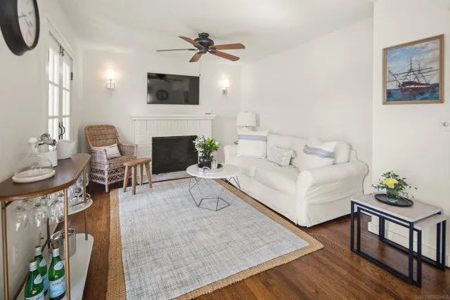 a view of front door and wooden floor