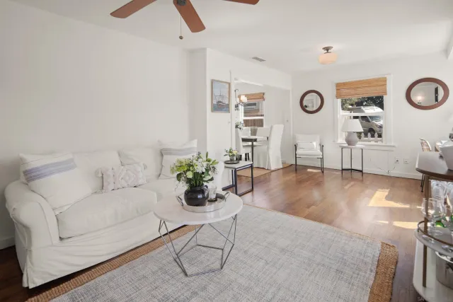 a living room with furniture and decor
