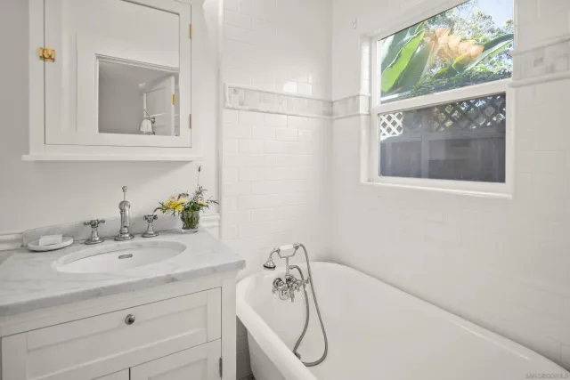 a backyard of a house with outdoor seating