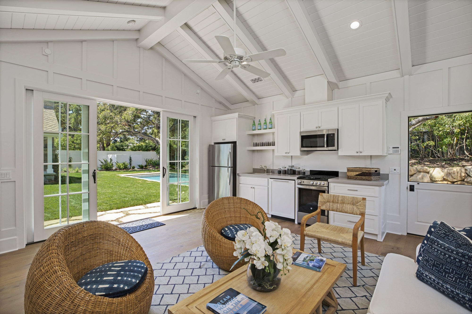 529 Santa Rosa Lane Montecito, CA 93108 - Photo 20 of 24 a living room with furniture fireplace and a large window
