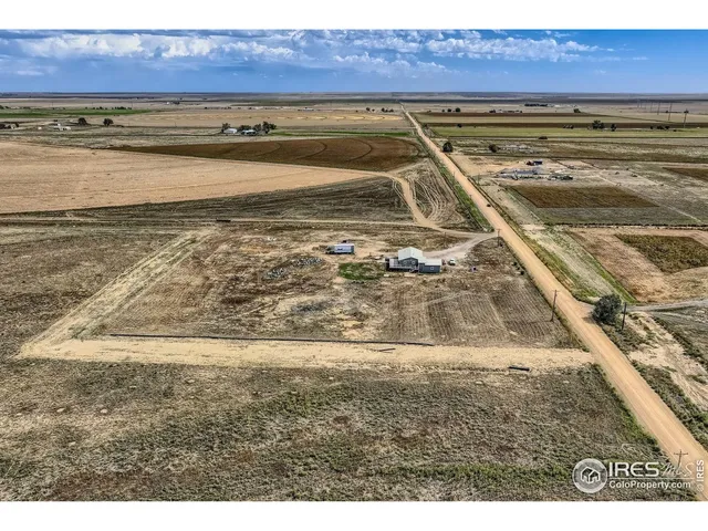 a view of a backyard of a house