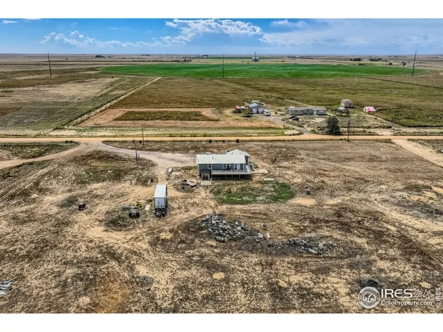 a picture of a building with an ocean beach
