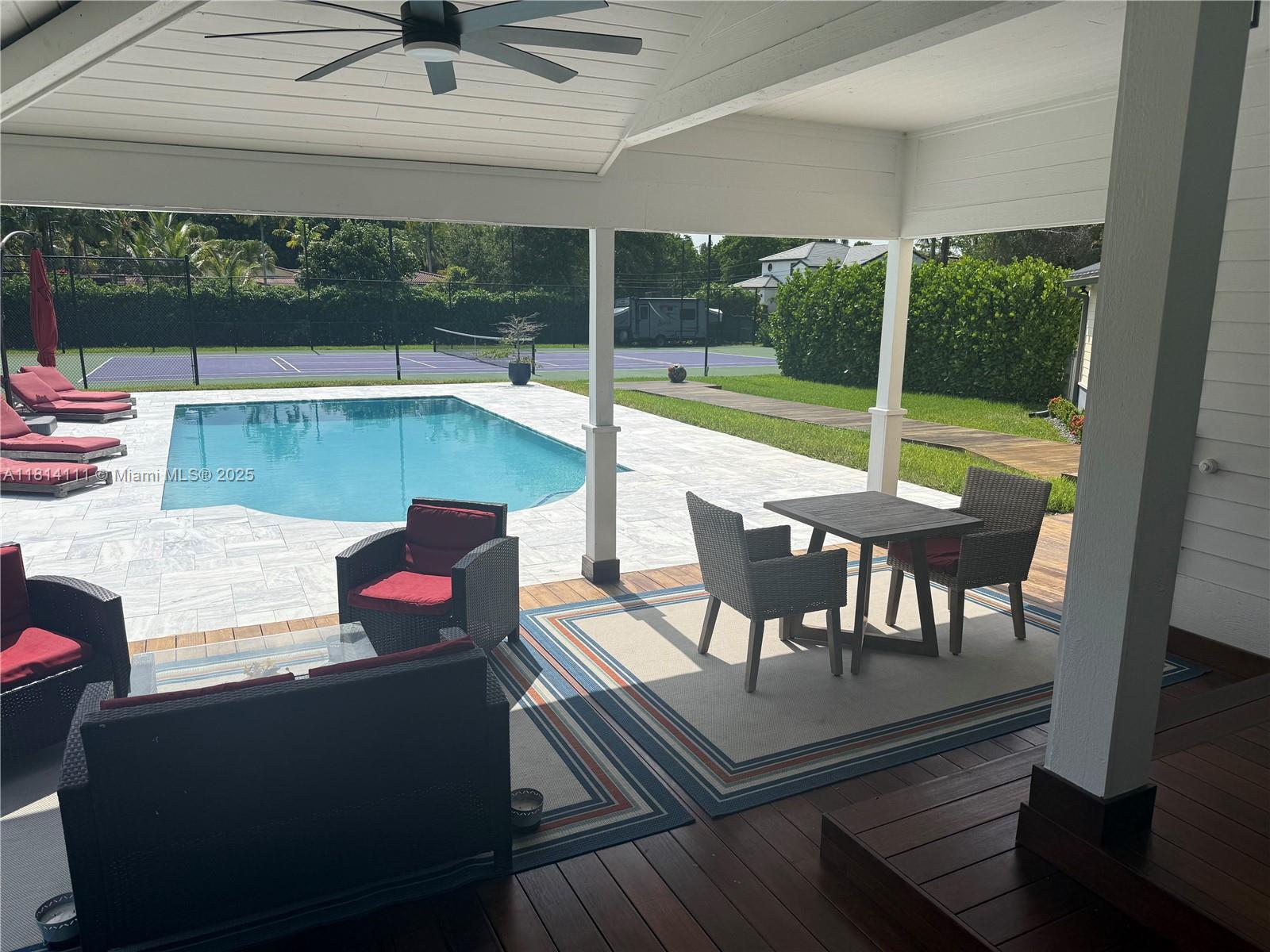 11820 Northwest 5th Street Plantation, FL 33325 - Photo 4 of 6 a view of a patio with swimming pool