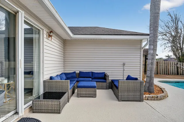 a building outdoor space with patio furniture