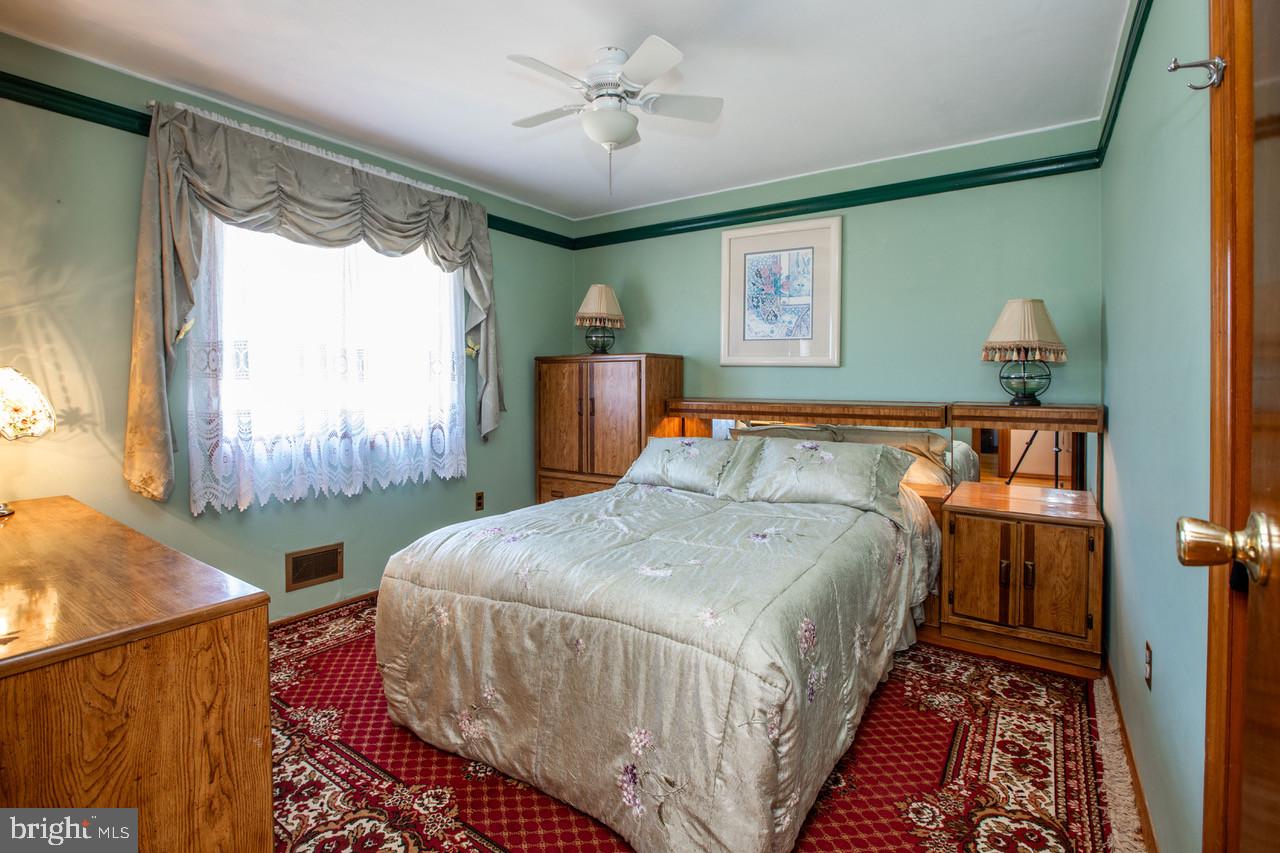 38 Albemarle Road Hamilton, NJ 08690 - Photo 17 of 39 a bedroom with a bed and a window