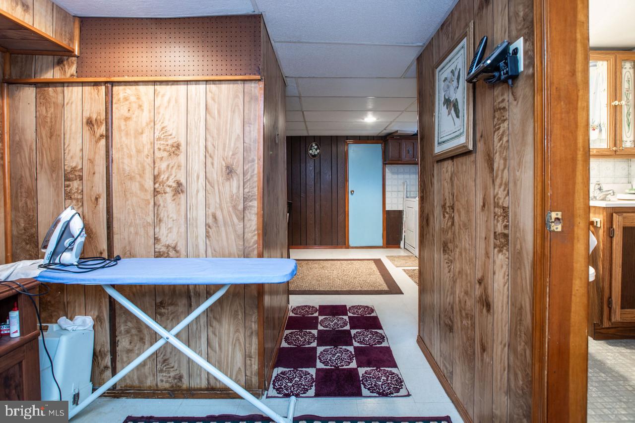 38 Albemarle Road Hamilton, NJ 08690 - Photo 32 of 39 a room with musical instruments and wooden floor