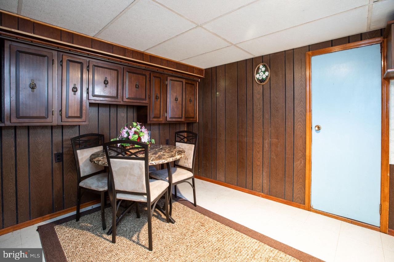 38 Albemarle Road Hamilton, NJ 08690 - Photo 33 of 39 a dining room with furniture and a window