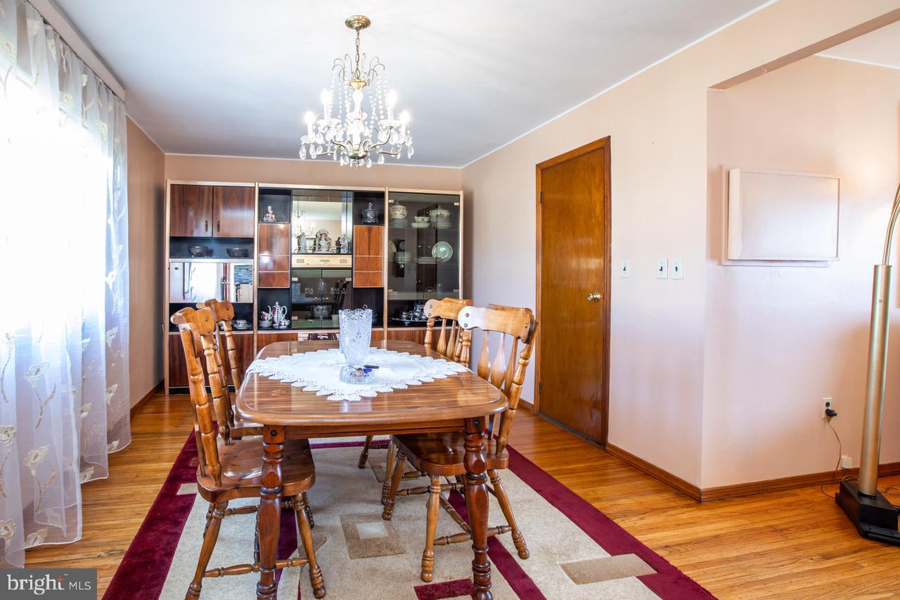 38 Albemarle Road Hamilton, NJ 08690 - Photo 10 of 39 a view of a dining room with furniture window and wooden floor