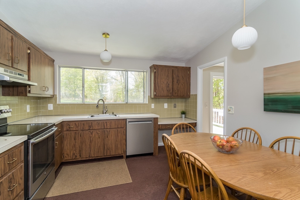 9 Clearview Drive Natick, MA 01760 - Photo 11 of 27 a kitchen that has a sink and a stove in it