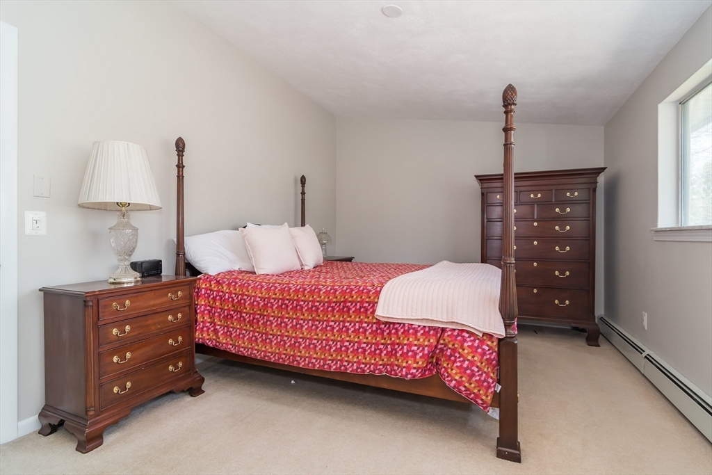 9 Clearview Drive Natick, MA 01760 - Photo 15 of 27 a bedroom with a bed and a window