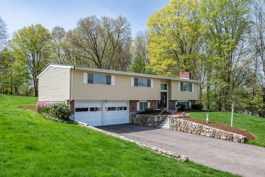 9 Clearview Drive Natick, MA 01760 - Photo 2 of 27 a view of a house with backyard and sitting area