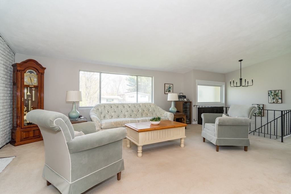 9 Clearview Drive Natick, MA 01760 - Photo 6 of 27 a living room with furniture and a window
