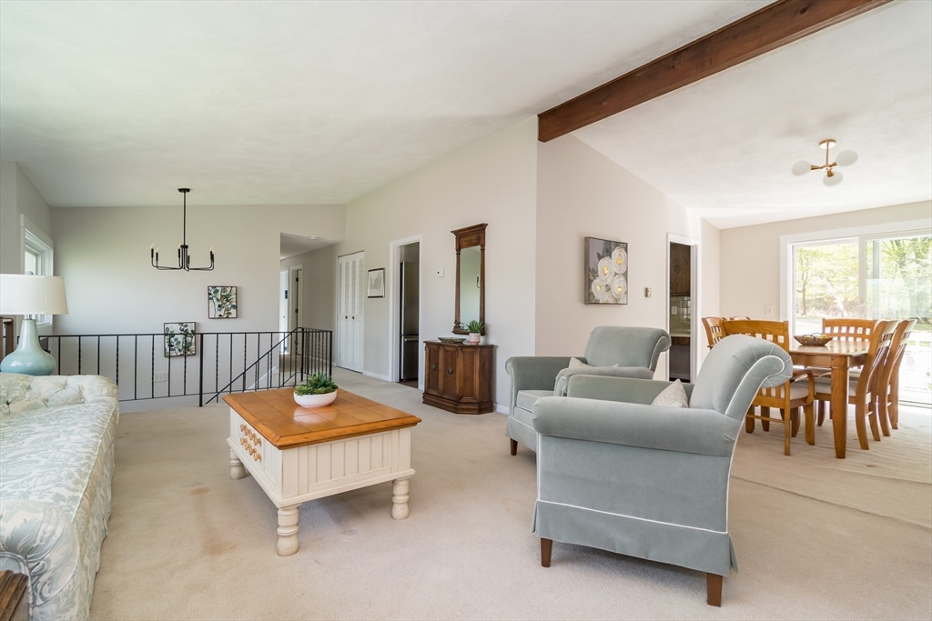 9 Clearview Drive Natick, MA 01760 - Photo 7 of 27 a living room with furniture and a table