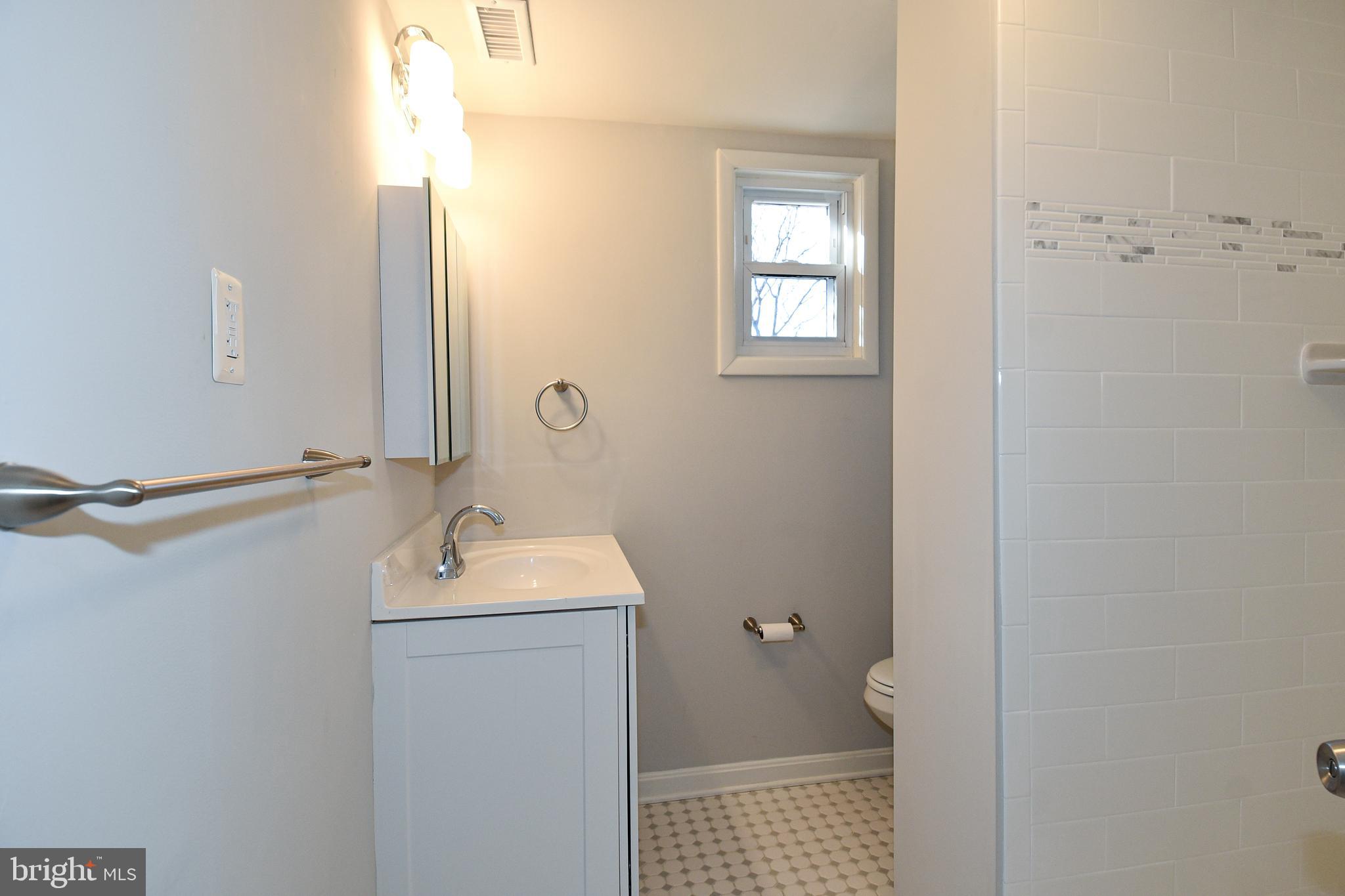 6831 Inverness Drive Springfield, VA 22150 - Photo 29 of 42 Remodeled bathroom