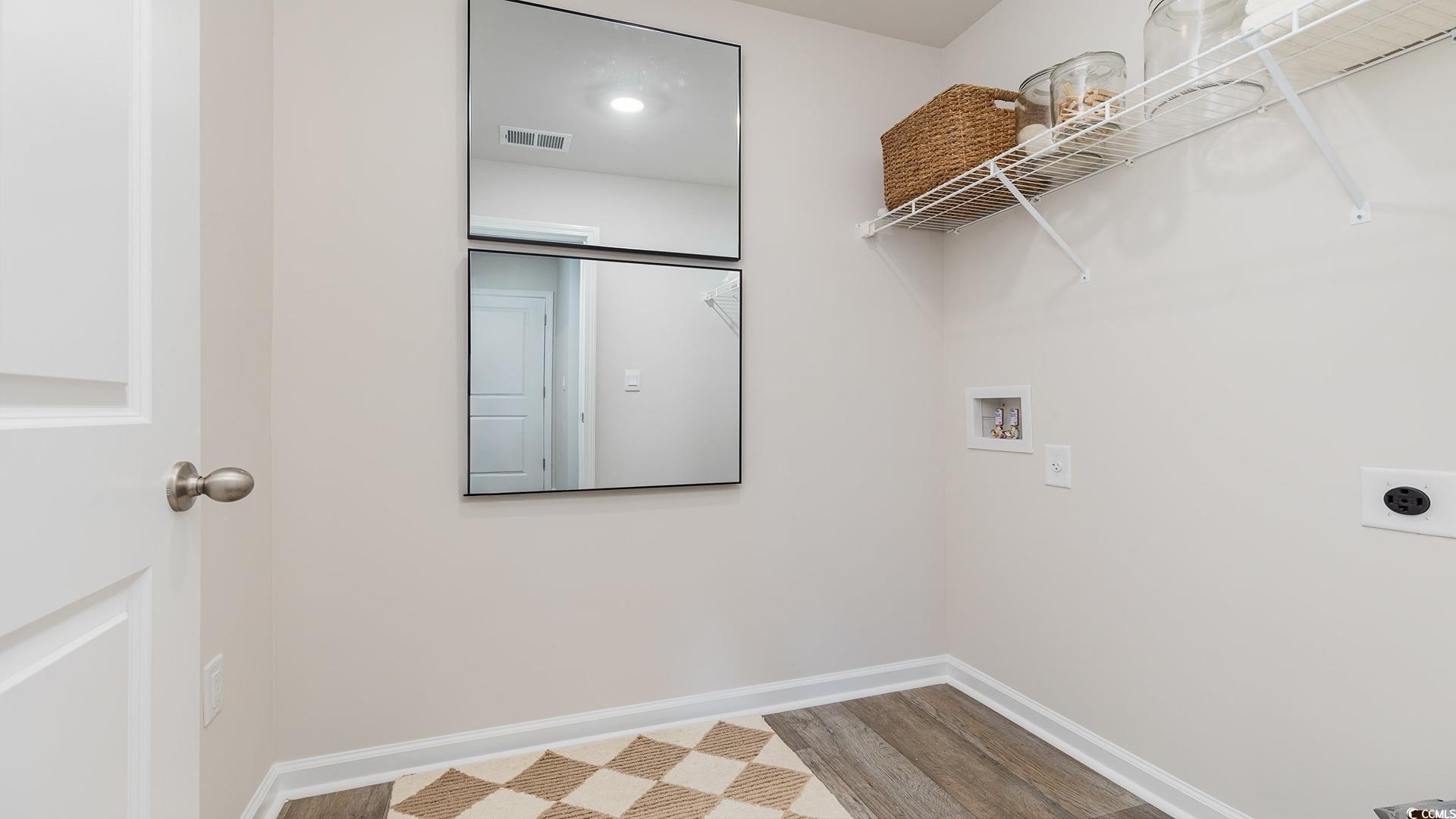 331 Acosta Circle Conway, SC 29527 - Photo 16 of 20 Laundry area with wood-type flooring, hookup for a
