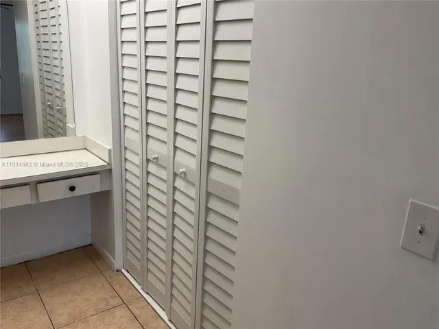 a bathroom with a sink and a shower