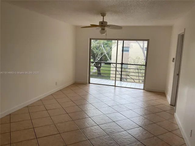 a view of a garden from a balcony