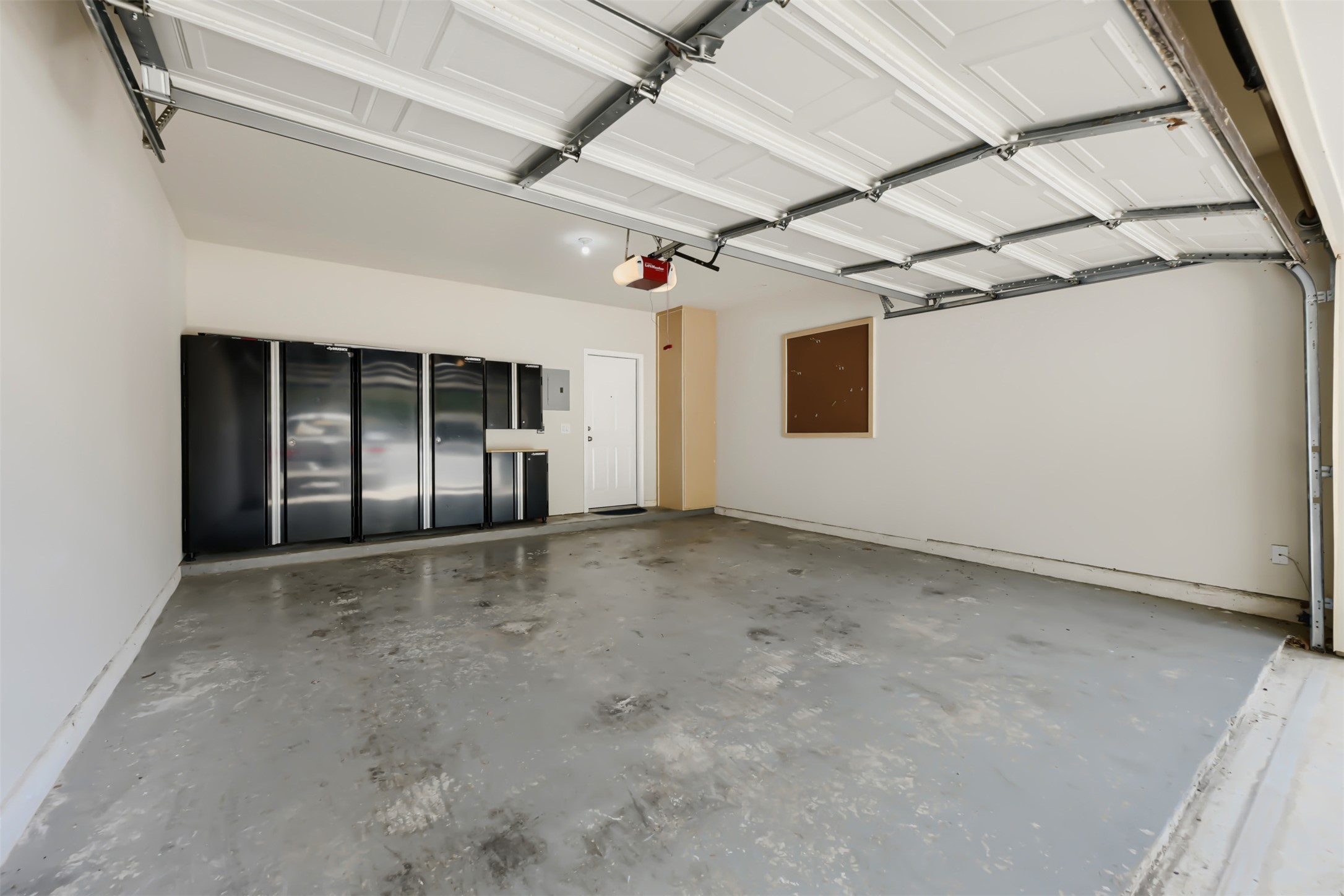 4508 Duval Road, Unit 5503 Austin, TX 78727 - Photo 31 of 31 A two car garage with storage!! This is a rare find for a condo.