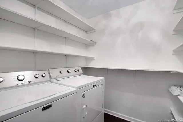 a utility room with dryer and washer