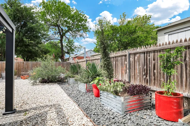 a garden view with a seating space