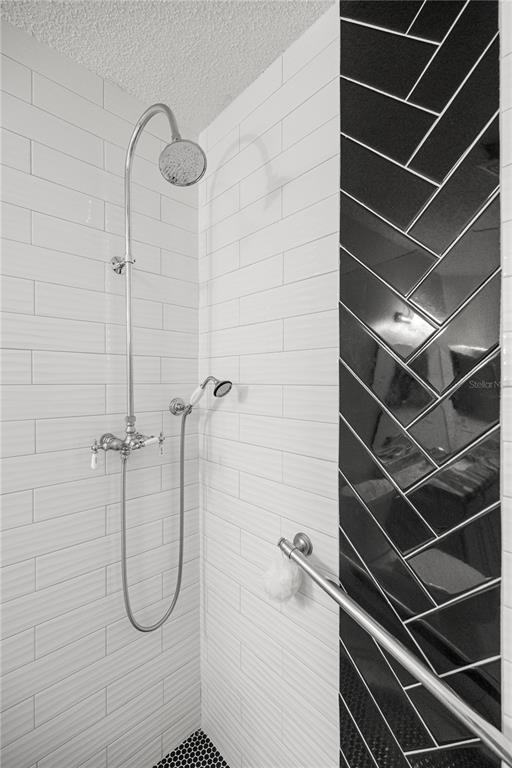 9438 Southwest 85th Avenue, Unit B Ocala, FL 34481 - Photo 17 of 32 a bathroom with a shower