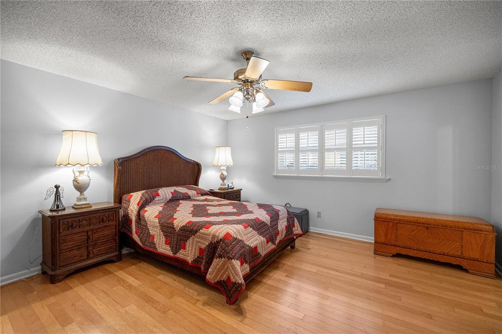 9438 Southwest 85th Avenue, Unit B Ocala, FL 34481 - Photo 10 of 32 a bedroom with bed and window