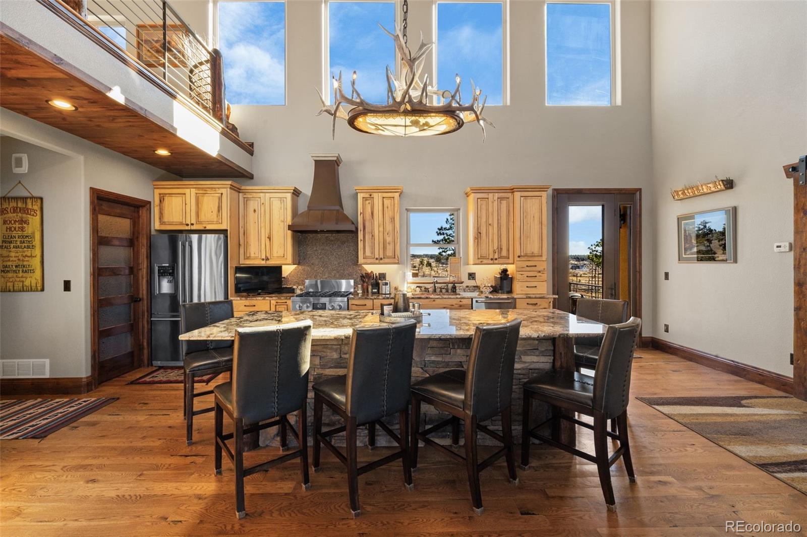 12875 Holmes Road Colorado Springs, CO 80908 - Photo 17 of 50 a view of a dining room with furniture