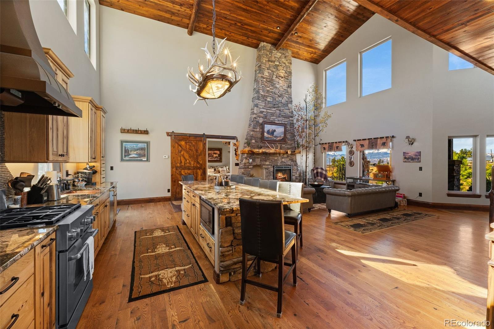 12875 Holmes Road Colorado Springs, CO 80908 - Photo 18 of 50 a view of a kitchen and dining room