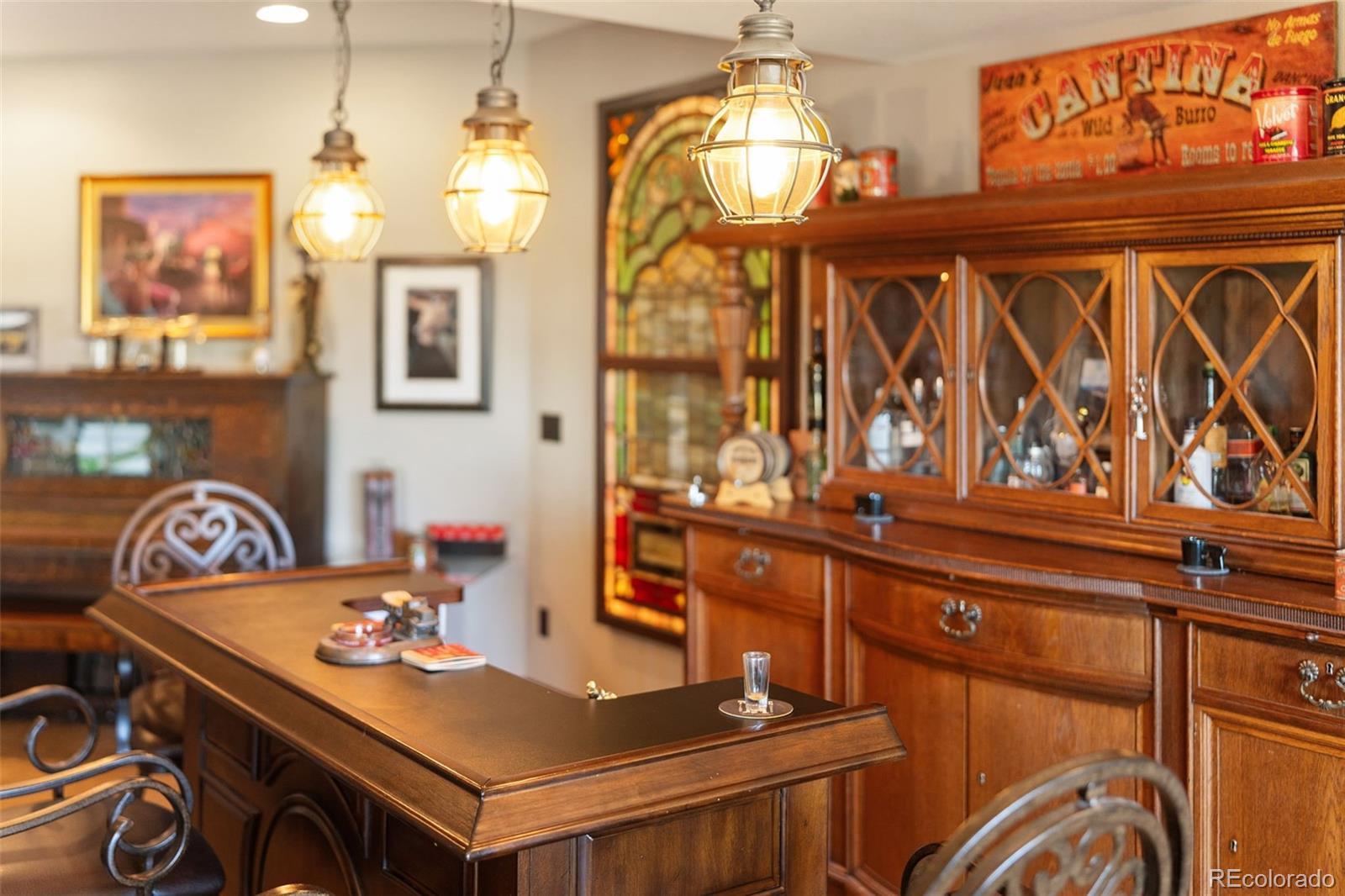 12875 Holmes Road Colorado Springs, CO 80908 - Photo 40 of 50 a view of a dining room with furniture