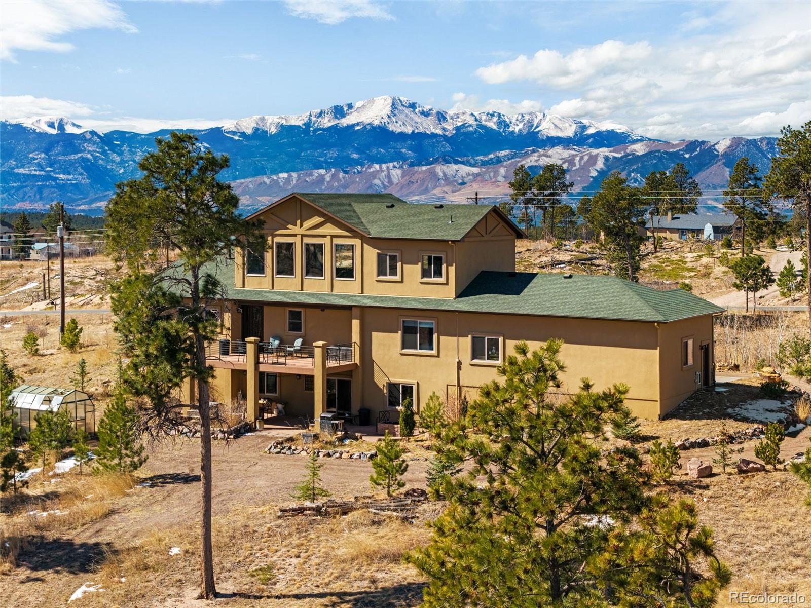 12875 Holmes Road Colorado Springs, CO 80908 - Photo 50 of 50 a view of a house with a yard