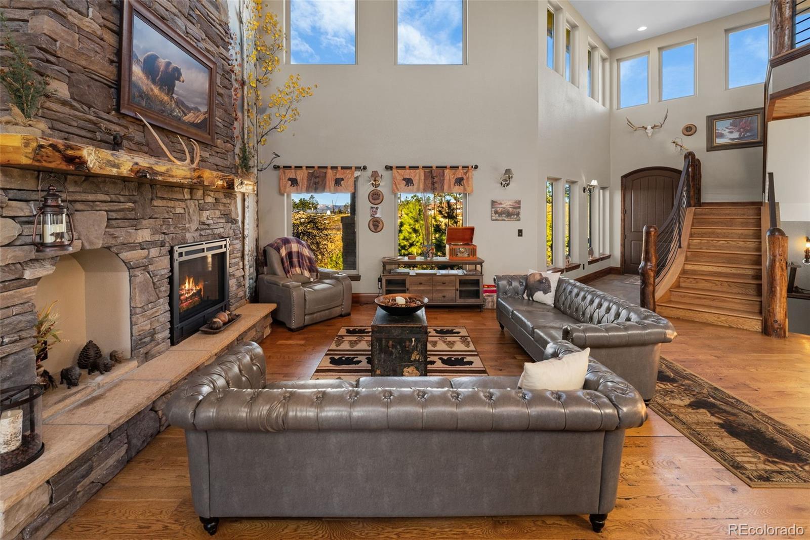 12875 Holmes Road Colorado Springs, CO 80908 - Photo 9 of 50 a view of living room with patio furniture and a fireplace