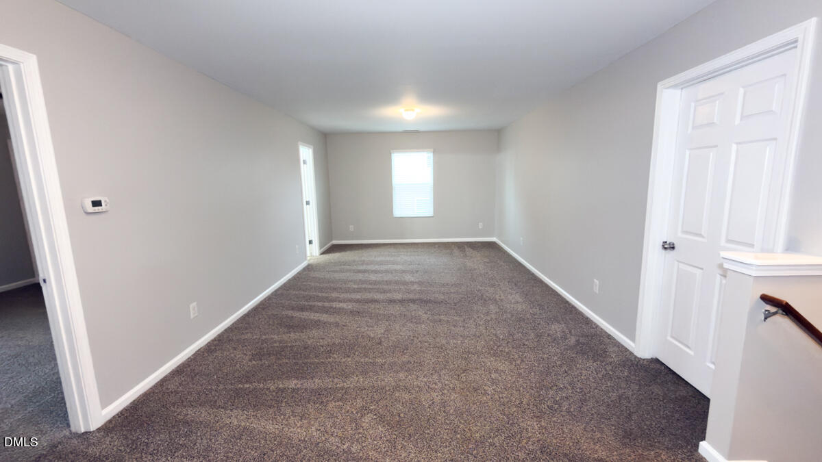 2608 Follow Me Way Raleigh, NC 27610 - Photo 15 of 32 a view of an empty room and window