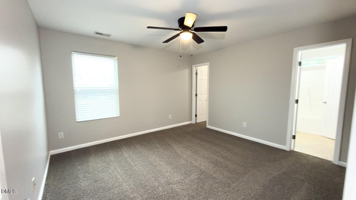 2608 Follow Me Way Raleigh, NC 27610 - Photo 24 of 32 a view of an empty room with a window