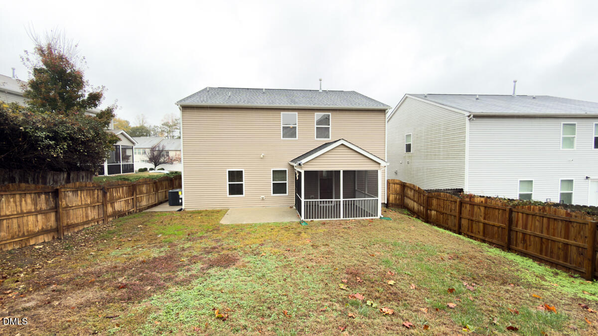 2608 Follow Me Way Raleigh, NC 27610 - Photo 27 of 32 a view of a house with a yard