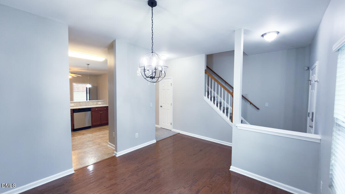 2608 Follow Me Way Raleigh, NC 27610 - Photo 4 of 32 a view of an entryway and wooden floor