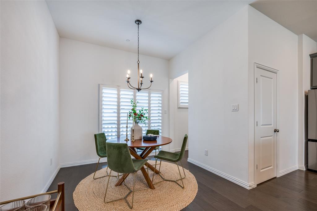 3718 Pelican Rst Way Arlington, TX 76005 - Photo 4 of 37 a view of a dining room with furniture window and wooden floor