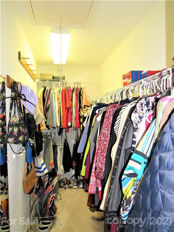 119 Farm Valley Road Fletcher, NC 28732 - Photo 14 of 21 a view of walk in closet with clothes