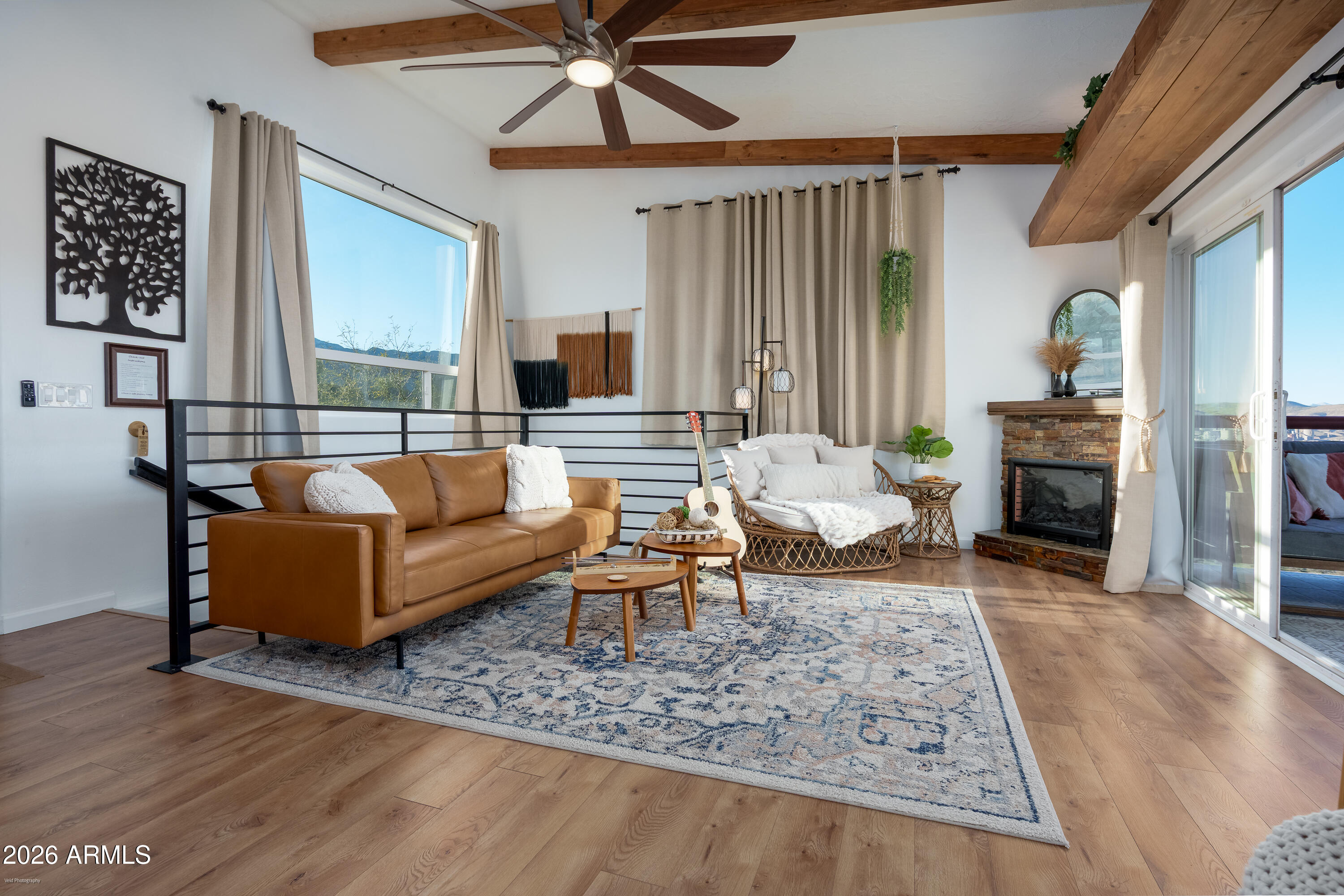 4550 Hopewell Mine Road Clarkdale, AZ 86324 - Photo 12 of 97 a living room with furniture and a fireplace