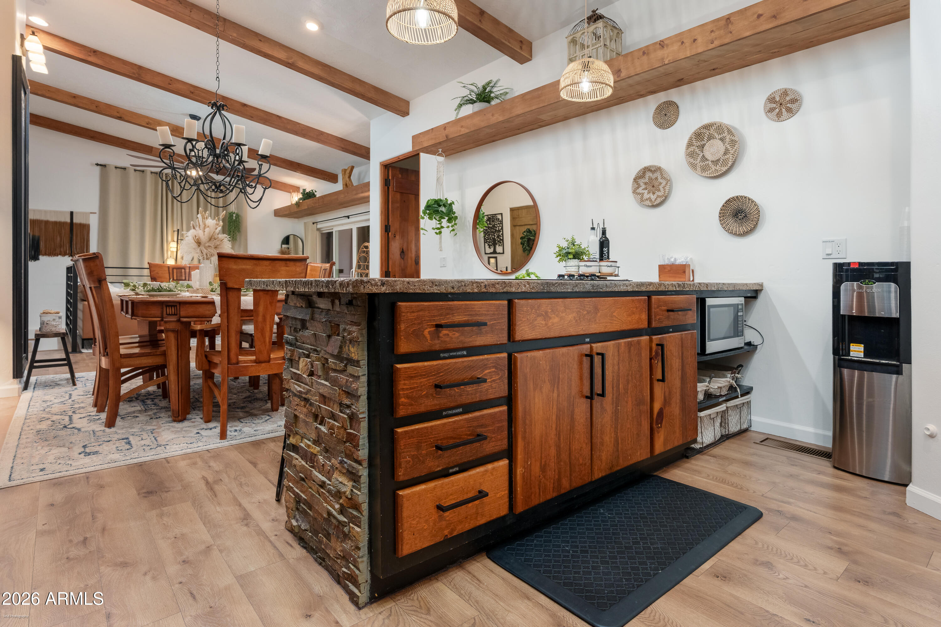 4550 Hopewell Mine Road Clarkdale, AZ 86324 - Photo 29 of 97 a view of a dining room with furniture and a chandelier
