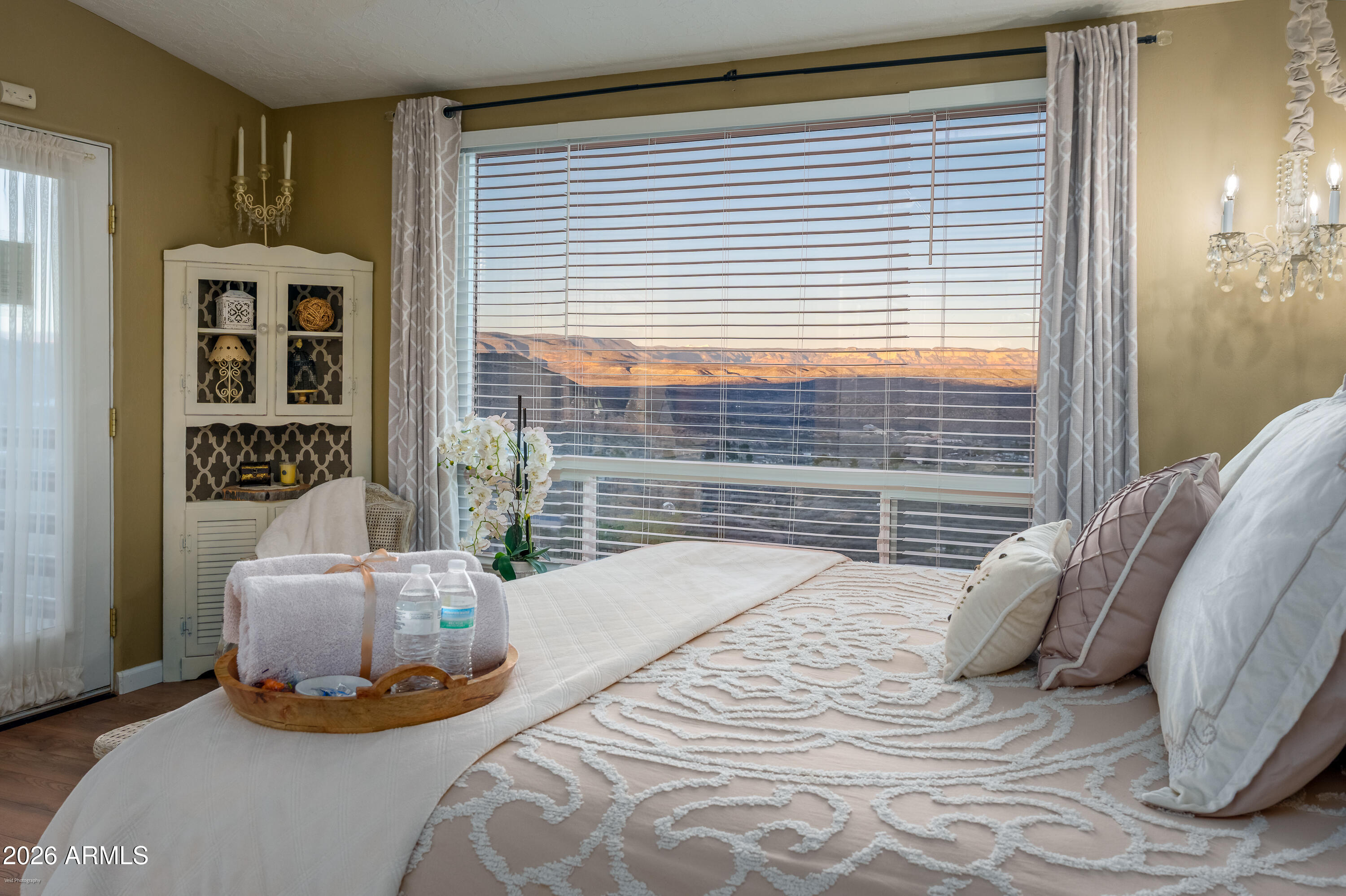 4550 Hopewell Mine Road Clarkdale, AZ 86324 - Photo 32 of 97 a bedroom with a bed and walk in closet